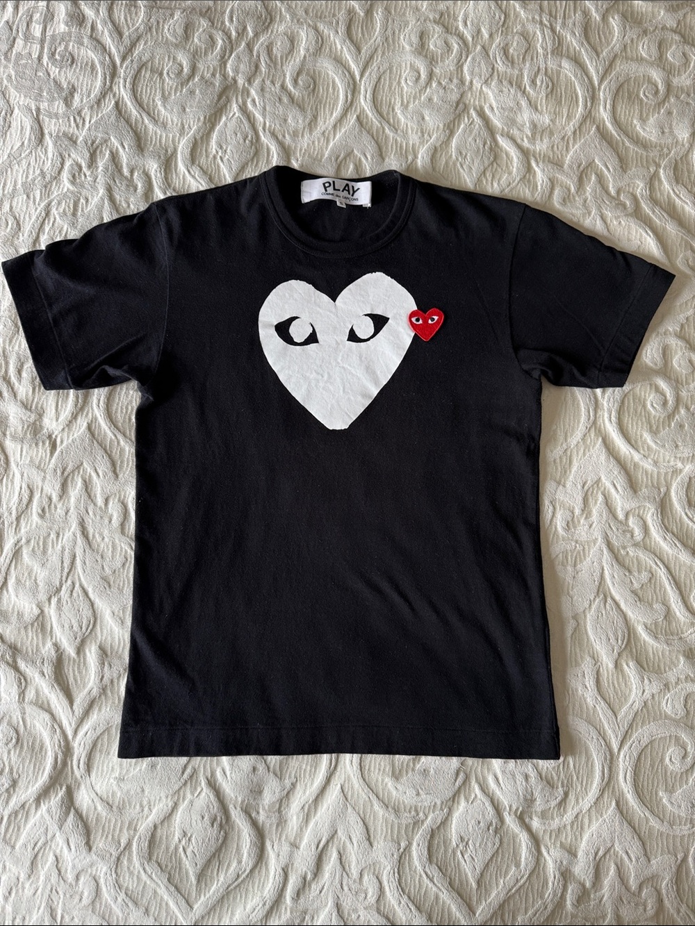 Comme des Garçons PLAY Black Tee with White and Red Heart Graphics - Men’s